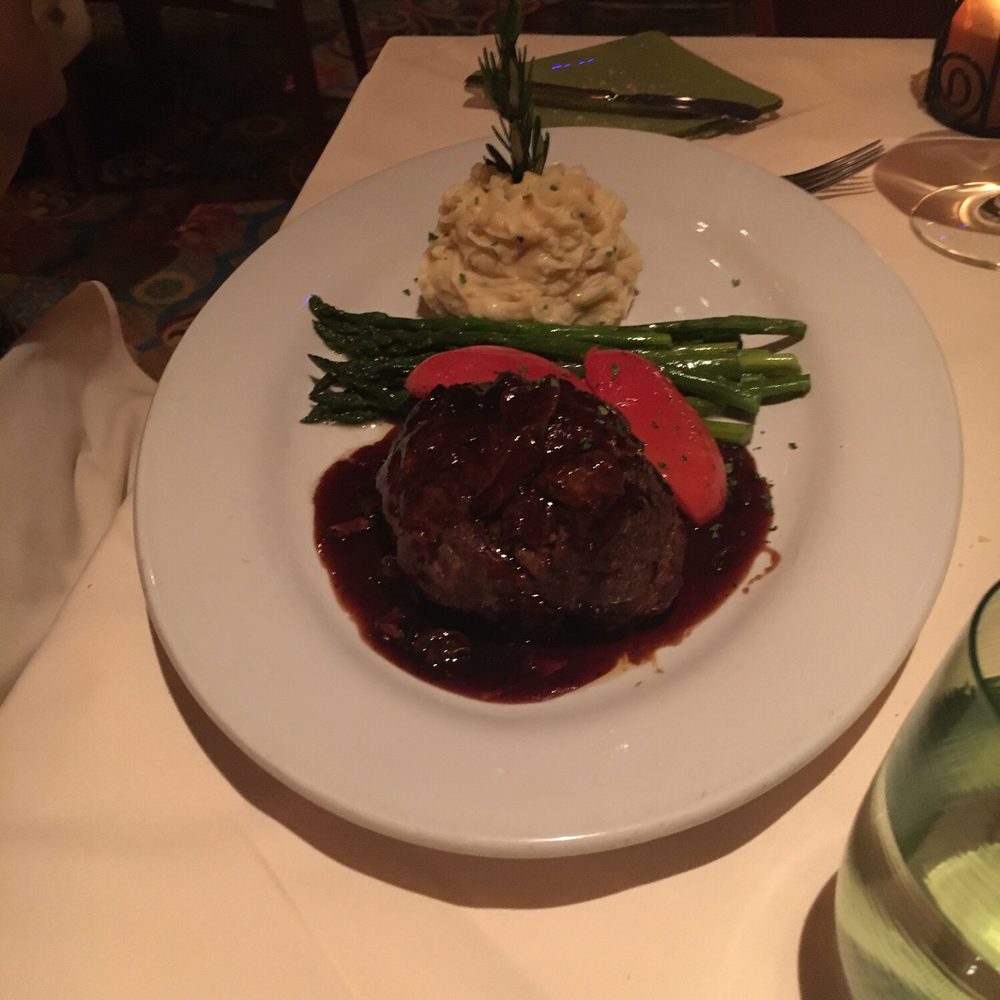 The Bistro - White Cheddar stuffed Meatloaf with mashed potatoes asparagus and tomatoes in a demi glaze - New American Near Me - Indio, California The Bistro - White Cheddar stuffed Meatloaf with mashed potatoes asparagus and tomatoes in a demi glaze - New American Near Me - Indio, California