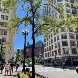 State Street, That Great Street - DePaul on the left, Harold Washington Center in the background right, and UIC Law on the foreground right.