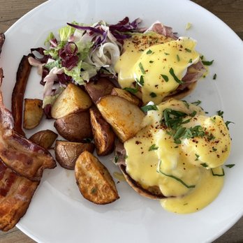 The Whistling Swan - Eggs Benedict with a side of bacon - Hotels Near Me - Fish Creek, Wisconsin