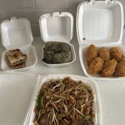 Turnip cake, sticky rice lotus leaves, fried taro puffs and beef chow fun Turnip cake, sticky rice lotus leaves, fried taro puffs and beef chow fun