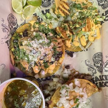 Talkin' Tacos Lake Nona - Taco trio- bang bang shrimp taco (top right), southwest chicken (middle) and birria (bottom right). - Tacos Near Me - Orlando, Florida Talkin' Tacos Lake Nona - Taco trio- bang bang shrimp taco (top right), southwest chicken (middle) and birria (bottom right). - Tacos Near Me - Orlando, Florida