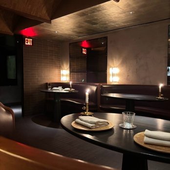 Lielle - The dining room at Lielle -- calm, intimate, and perfectly lit. Every detail feels intentional, from the curved booths to the candlelight. - American Near Me - Los Angeles, California