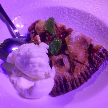 Urban Crust - (Again sorry for blue lighting!) strawberry rhubarb pie with ice cream that tastes like a mix of love and childhood! - Pizza Near Me - Plano, Texas Urban Crust - (Again sorry for blue lighting!) strawberry rhubarb pie with ice cream that tastes like a mix of love and childhood! - Pizza Near Me - Plano, Texas