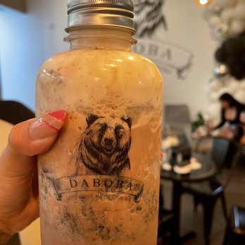 Daboba - a hand holding a jar of iced coffee - Bubble Tea Near Me - Miami, Florida