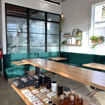 Roots Coffeehouse - a table with jars of coffee on it - Coffee & Tea Near Me - Fort Worth, Texas Roots Coffeehouse - a table with jars of coffee on it - Coffee & Tea Near Me - Fort Worth, Texas