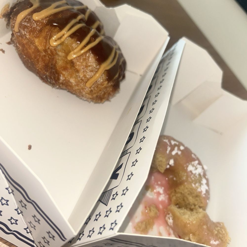 Peanut butter chocolate doughnut, and strawberry gluten-free doughnut Peanut butter chocolate doughnut, and strawberry gluten-free doughnut