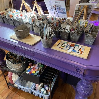 Keyport Funhouse Boutique - a purple table with lots of craft supplies - Coffee & Tea Near Me - Keyport, New Jersey