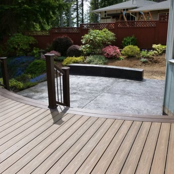Top Shelf Construction - a view of a backyard deck - General Contractors Near Me Top Shelf Construction - a view of a backyard deck - General Contractors Near Me