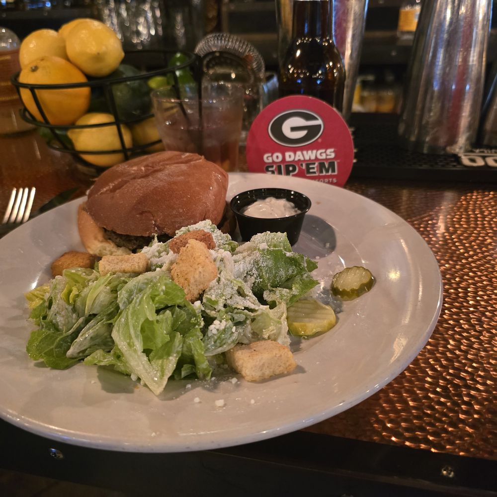 Publik Draft House - Gorgonzola burger and casar salad, coors light, titos and cran. - Pubs Near Me - Atlanta, Georgia Publik Draft House - Gorgonzola burger and casar salad, coors light, titos and cran. - Pubs Near Me - Atlanta, Georgia