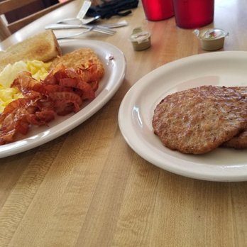 Covered Bridge - Eggs, hashbrown pattie, sausage, bacon and toast - New American Near Me - Dunedin, Florida