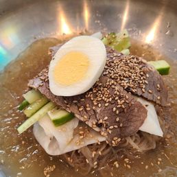 Icy Spicy with spice on the side. Chilled noodles, cucumber, pickled radish, egg & brisket in an incredible slush textured soup Icy Spicy with spice on the side. Chilled noodles, cucumber, pickled radish, egg & brisket in an incredible slush textured soup