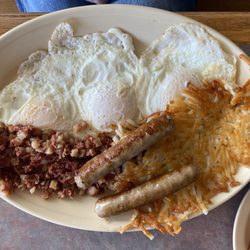 Pano's Cafe - Corned beef hash, eggs over easy, hash browns, and sausage