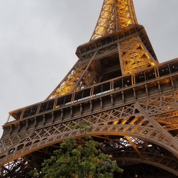 La Tour Eiffel - Sunset on a cloudy day, at the first light display - Landmarks & Historical Buildings Near Me - Paris, 75