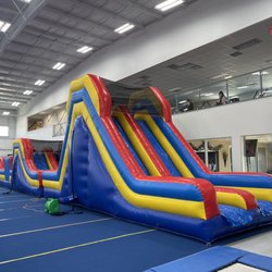 Fun & Fitness Gymnastics - Our new inflatable for parties, camps, and Friday Fun Night!