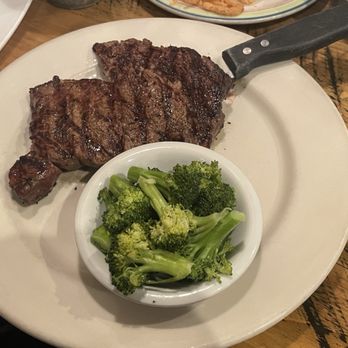 Blue Rooster Southern Grill - 14 oz ribeye with broccoli - American Near Me - Clyde, North Carolina