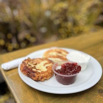 Cinderella - Syrniki with sour cream and jam. I prefer it with the sour cream - Bakeries Near Me - San Francisco, California Cinderella - Syrniki with sour cream and jam. I prefer it with the sour cream - Bakeries Near Me - San Francisco, California
