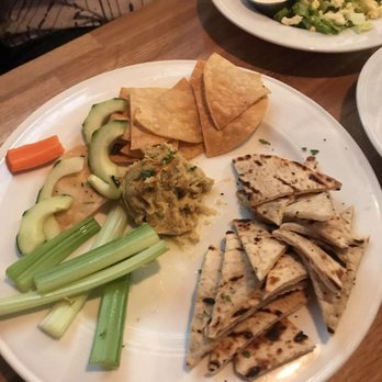 Didi’s Downtown - Hummus plate, already eaten from. The plate was full, portion was healthy. - Cheesesteaks Near Me - Frisco, Texas