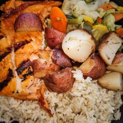 Salmon, potatoes, broccoli, and brown rice