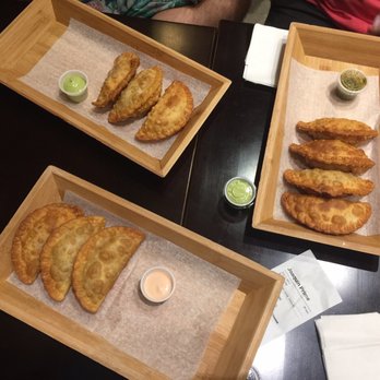 Empanada City - Stamped empanadas. Signature chicken, Cuban, platano and cheese, & americano - Empanadas Near Me - Brooklyn, New York