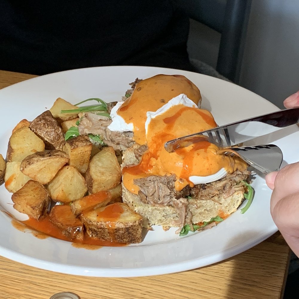 Miles Table - Eggs Benedict. My friend added hot sauce. - American Near Me - Philadelphia, Pennsylvania Miles Table - Eggs Benedict. My friend added hot sauce. - American Near Me - Philadelphia, Pennsylvania