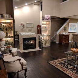 a living room with a fireplace a living room with a fireplace