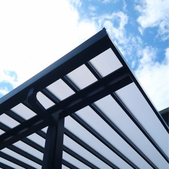 Sound Patio Solutions - Modern aluminum pergola with polycarbonate roof panels - Patio Coverings Near Me - Edgewood, Washington Sound Patio Solutions - Modern aluminum pergola with polycarbonate roof panels - Patio Coverings Near Me - Edgewood, Washington