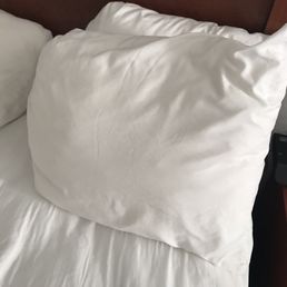 Tiny, old and used pillows where the pillowcases didn't even fit the pillows. Tiny, old and used pillows where the pillowcases didn't even fit the pillows.