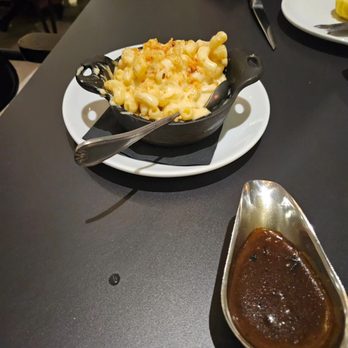 Echo & Rig - Macaroni and cheese and charred onion sauce on the right - Steakhouses Near Me - Henderson, Nevada