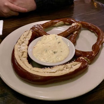 Sammy G's Tavern - Pretzel appetizer (sans hook) with cheese - American Near Me - High Point, North Carolina