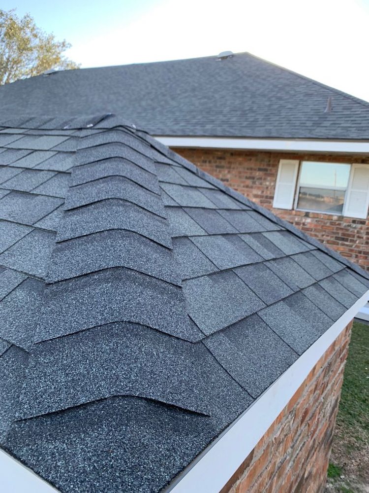 Slide of Pelican Roofing Company