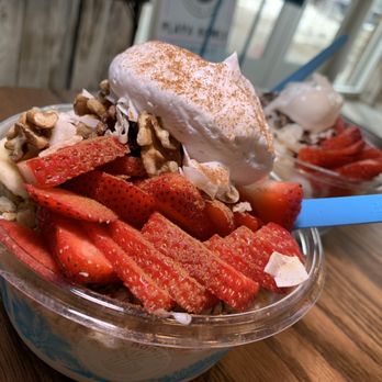 Playa Bowls - Avalanche Coconut Bowls: Blue Spirulina Coconut Base, Strawberries, Walnuts, Coconut Flakes, Coco-Whip, Cinnamon, substitute Vegan Granola. - Coffee & Tea Near Me - Kalamazoo, Michigan