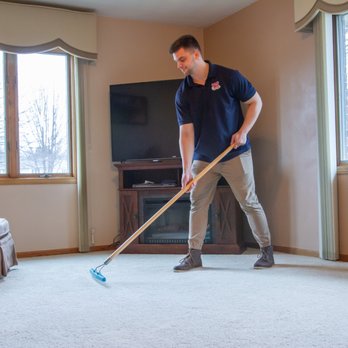 Heaven's Best Carpet Cleaning - Step 4: Spray carpet protector & rake into fibers - Carpet Cleaning Near Me - Waverly, Iowa Heaven's Best Carpet Cleaning - Step 4: Spray carpet protector & rake into fibers - Carpet Cleaning Near Me - Waverly, Iowa