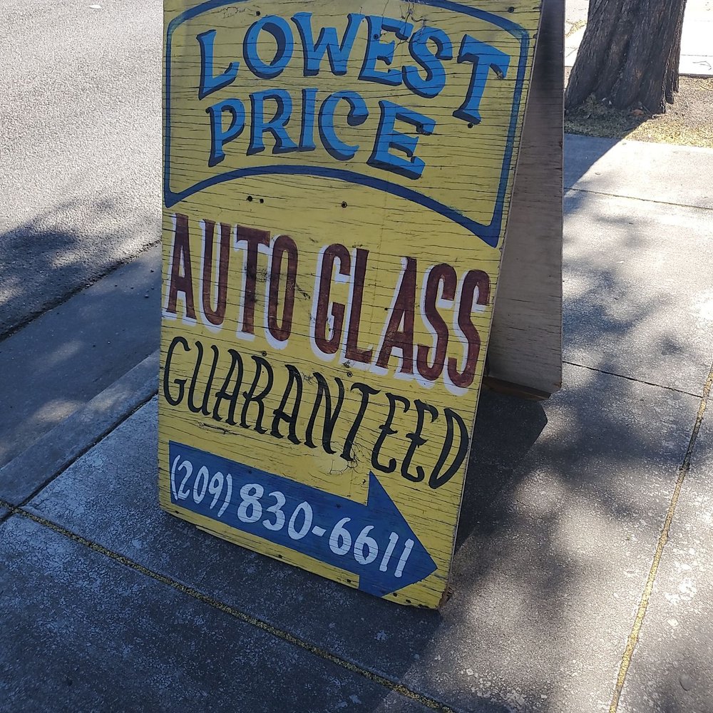 Lowest Price Auto Glass - Rustic wooden sign for their business on eleventh Street. - Auto Glass Services Near Me - Tracy, California