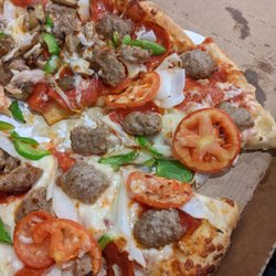 Marco's Pizza - Pizza with tomatoes (on one half, mushrooms on the other), sausage, pepperoni, onions, and green pepper.