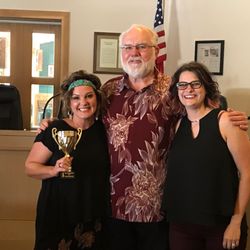 J Gibson Salon - Joyce, Tom Schoolcraft(Helotes Mayor) and Caitlin accepting the award for 1st Commercial Float in the 2017 Helotes Cornyvall Parade