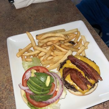 Aqua Tequilas - a plate with a burger and fries - Seafood Near Me - Yakima, Washington