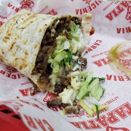 Carne Asada burrito..1/2 I couldn't wait. Very good