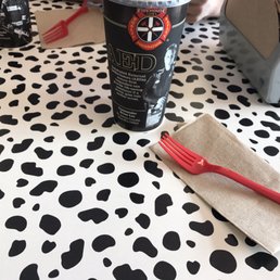 Dalmatian patterned table tops and red forks!