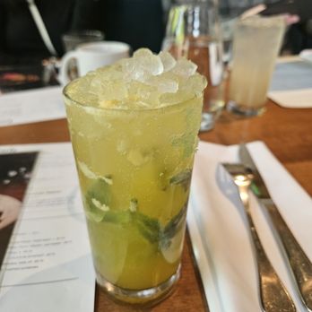 Earls Kitchen + Bar - mango cooler non-alcoholic cocktai - New American Near Me - Bellevue, Washington Earls Kitchen + Bar - mango cooler non-alcoholic cocktai - New American Near Me - Bellevue, Washington