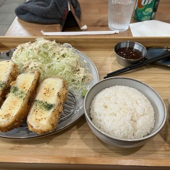 Lucky Pig - Cheese katsu, goes perfect dunked in that sweet chili sauce and topped with that jalapeño relish they give. - Korean Near Me - Whittier, California Lucky Pig - Cheese katsu, goes perfect dunked in that sweet chili sauce and topped with that jalapeño relish they give. - Korean Near Me - Whittier, California