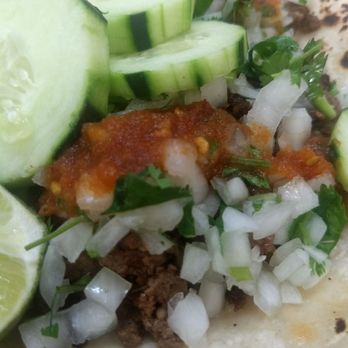 La Cachanilla - Close up of asada tacos with everything on them - Convenience Stores Near Me - Pomona, California
