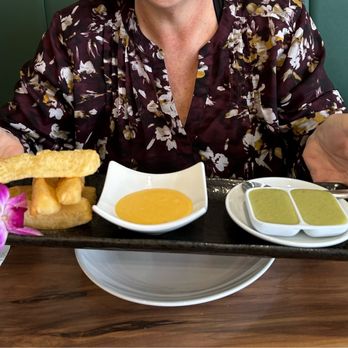 Sr Ceviche - Fried Yuca with cheese sauce and a jalapeño cilantro dip. - Peruvian Near Me - Neptune Beach, Florida