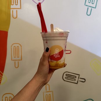 Kulfi - a hand holding a cup of ice cream - Ice Cream & Frozen Yogurt Near Me - Portland, Oregon Kulfi - a hand holding a cup of ice cream - Ice Cream & Frozen Yogurt Near Me - Portland, Oregon