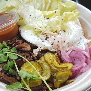 Dialog Cafe - Brisket Bowl. Brown rice, fried runny egg, pickled cucumbers and onions, lettuce, bbq sauce. Brisket was crispy and tender - Cafes Near Me - West Hollywood, California Dialog Cafe - Brisket Bowl. Brown rice, fried runny egg, pickled cucumbers and onions, lettuce, bbq sauce. Brisket was crispy and tender - Cafes Near Me - West Hollywood, California