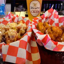 two baskets of food and a drink two baskets of food and a drink