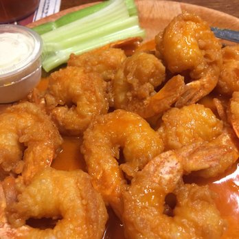 Fish Shack - Buffalo shrimp app: large shrimp in buffalo sauce with side of celery BD blue cheese. Yum! - Seafood Near Me - Lighthouse Point, Florida Fish Shack - Buffalo shrimp app: large shrimp in buffalo sauce with side of celery BD blue cheese. Yum! - Seafood Near Me - Lighthouse Point, Florida
