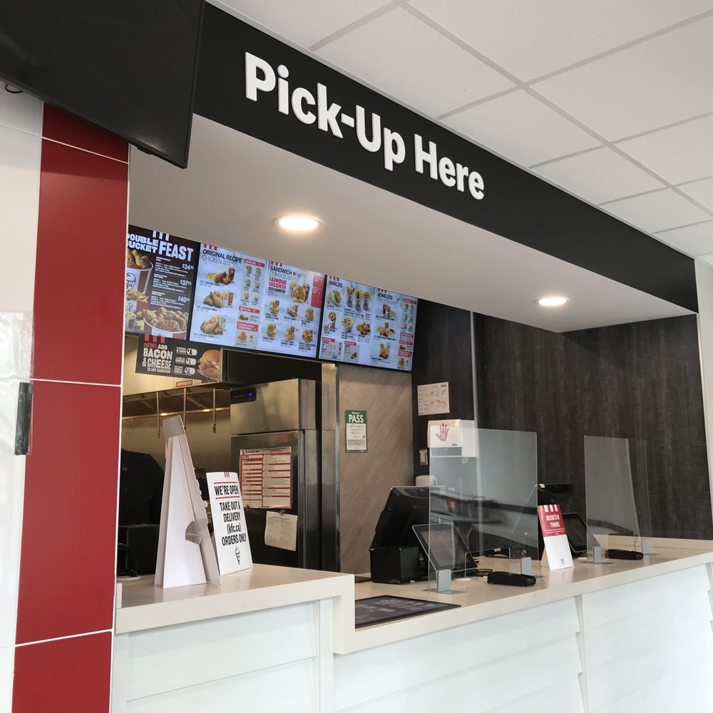 KFC - the front of a restaurant with a menu on the wall - Fast Food Near Me - Toronto, Ontario KFC - the front of a restaurant with a menu on the wall - Fast Food Near Me - Toronto, Ontario