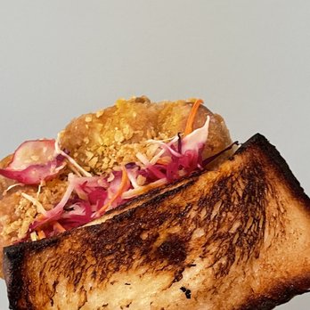 Potluck Hawker Eatery - Salted egg yolk fried chicken sandwich - Indonesian Near Me - Vancouver, British Columbia Potluck Hawker Eatery - Salted egg yolk fried chicken sandwich - Indonesian Near Me - Vancouver, British Columbia