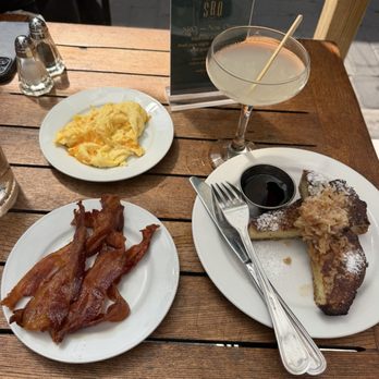 Anthony David's - French Toast Entree, Toasted Coconut Butter side of eggs and bacon - Breakfast & Brunch Near Me - Hoboken, New Jersey Anthony David's - French Toast Entree, Toasted Coconut Butter side of eggs and bacon - Breakfast & Brunch Near Me - Hoboken, New Jersey