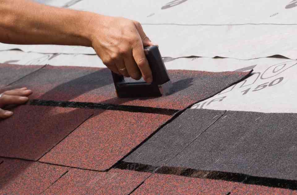 Slide of Two Men Roofing